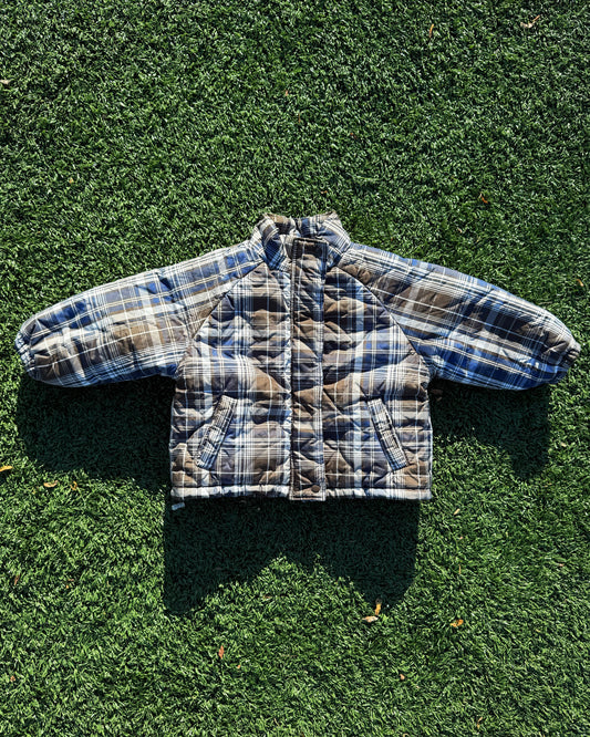 Kids padded winter plaid jacket on grass